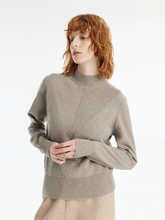 a lady in a camel cashmere mock neck women pullover sweater